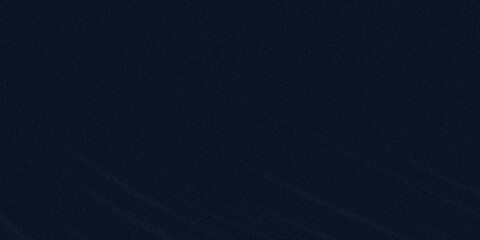 Fototapeta premium A dark navy blue abstract background with a grainy texture creates a modern artistic effect