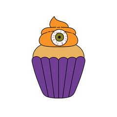 A cupcake with a green eye on top of it