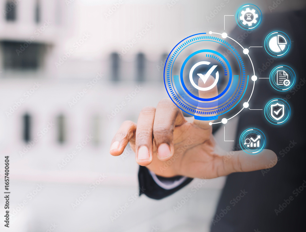 Poster hand interacting with glowing digital interface showing quality assurance symbols