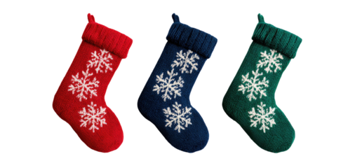 Three Christmas stockings, red, navy blue, and green, each decorated with white snowflakes