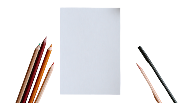 Blank white paper surrounded by colored pencils and a black marker