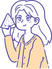 A cheerful young woman with long hair and freckles holds up a triangular slice of food, smiling contentedly.