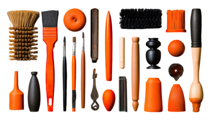 Assorted tools and brushes in orange and black
