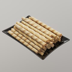 Crispy wafer rolls on a black serving tray