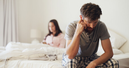 Frustrated man, fight or conflict with stress in bed for breakup, quarrel or argument. Upset...