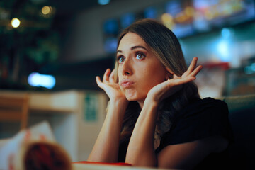 Woman Covers her Ears in a Restaurant Disliking the Noise and Music. Person complaining about the...