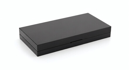 Fototapeta premium A sleek black rectangular box with a glossy finish sitting on a plain white surface in a studio shot