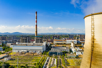 Thermal power plant under blue sky and white clouds