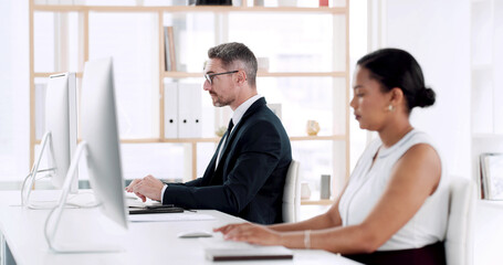 Coworking, computer and typing with business people in office for report, research or planning. Tech, idea and thinking with employees in agency for productivity, information and schedule or feedback