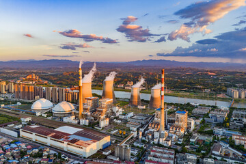 Thermal power plant at sunset