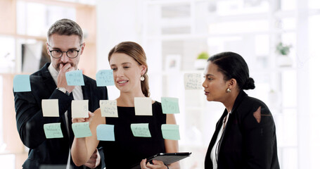 Office, man and ideas with women, sticky notes or brainstorming for proposal, accountant or meeting. Glass, financial analyst and people with plan for investment, discussion and teamwork in business