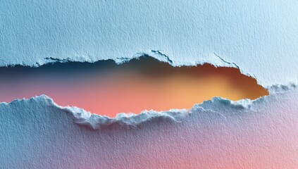 Torn light blue paper revealing sunset; design texture background