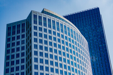 Business skyscraper building. Architectural building business area. Glass skyscraper. City architecture. Architecture of office building. Perspective skyscraper. High rise glass architecture