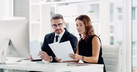 Coworking, advice and business people with document for report, computer and discussion on project....
