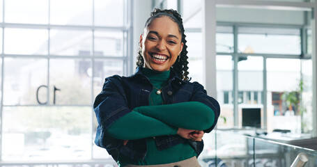 Portrait, business and happy woman in office, arms crossed and confident personality with creative...