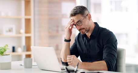 Business, man and laptop with headache in office for finance mistake, auditing deadline and stress....