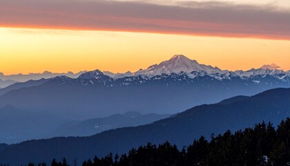 Fototapeta premium Majestic mountain range silhouette captured under a fiery sunrise sky display