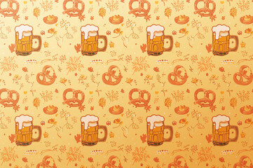 Oktoberfest pattern with beer mugs and pretzels on a golden background.