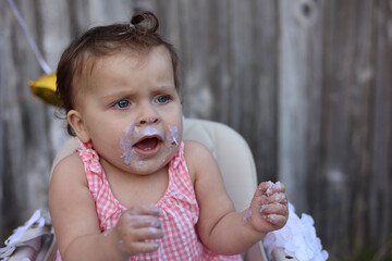 Cute little girl on her first birthday