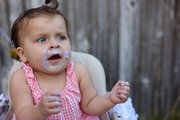 Cute little girl on her first birthday
