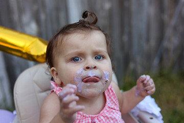Cute little girl on her first birthday