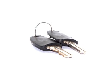 A metallic bunch of shiny car keys isolated on a white background