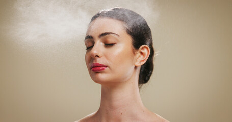 Spray, beauty and makeup with woman in studio with setting mist, skincare product and cosmetics. Hydration, glow and dermatology treatment with person on brown background with space, facial and shine