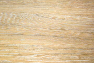 Light beige wood surface with natural grain patterns, ideal for interior design and craftsmanship...