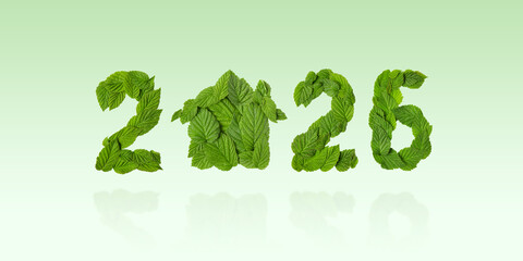 Green leaves in the shape of numbers 2026 and home on a green background. New Year 2026 save it earth environment and our planet. Earth day 2026 concept and green recycling
