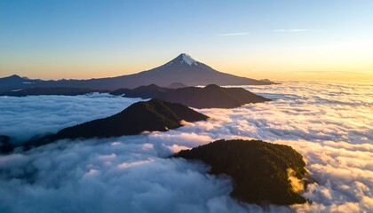 Aerial panorama of majestic peak piercing ethereal cloudscape at golden hour serenity