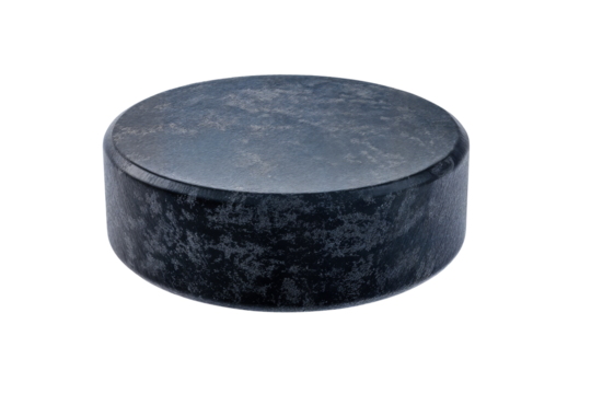 Ice hockey puck isolated on a dark background for sports and recreation theme image photo on transparent background