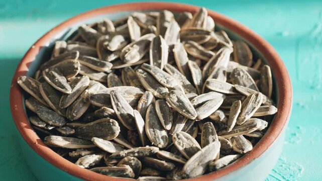 sunflower seeds in a bowl close up	