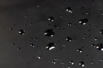 wet film on the screen , transparent protective soft film glued to the touch screen of a modern device covered with water droplets