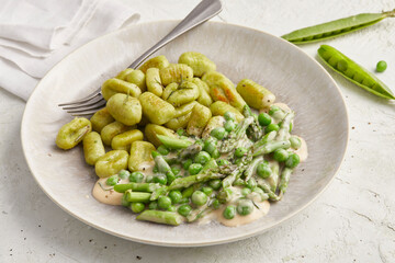 Pea gnocchi with asparagus