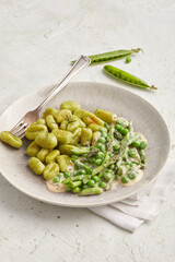 Pea gnocchi with asparagus