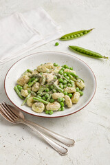Pea gnocchi with asparagus