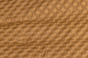 soft corrugated paper made of waste paper for storing and transporting equipment and objects, paper details with a raised surface and a large number of irregularities