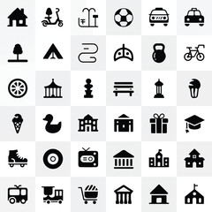 Fototapeta premium A set of 40 black and white city icons arranged in a 8x5 grid on a light gray checkered background .