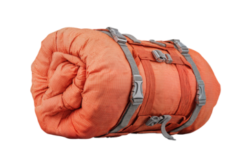 High-quality orange camping sleeping bag in compact rolled position for outdoor adventures on transparent background