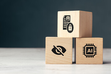 Wooden blocks with icons of AI, hidden view, and data protection, concept of data privacy, personal...