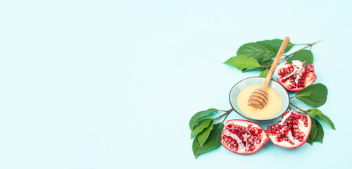 Rosh hashanah, jews celebrate new year of jewish calendar, pomegranate with honey, food for holiday...