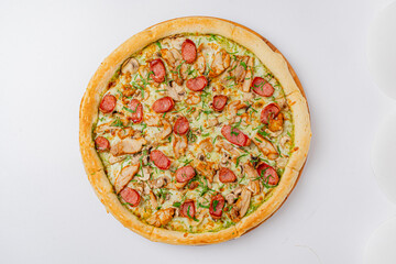 Savor melts of cheese atop a crispy crust, featuring chicken, sausage, and vibrant greens
