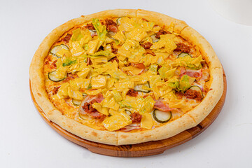 Delicious pizza features fresh toppings of ham, crunchy lettuce, and savory cheese, ready to enjoy