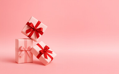 pink gift box with ribbon. Pastel Pink Gift Box Stack with Satin Ribbons on Solid Background.
