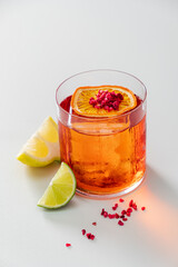 A vibrant cocktail blends citrus flavors with colorful garnishes, enticing and refreshing