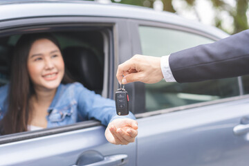 Business car rental, sell or buy service, dealership hand of agent dealer, sale man giving auto key...