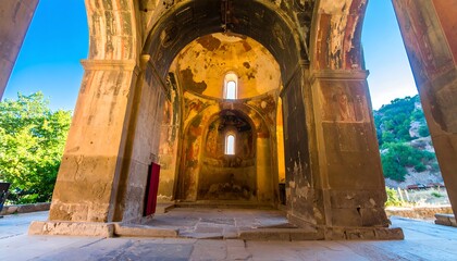Interior view of a weathered ancient church.