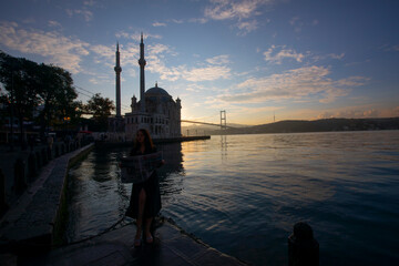 Fototapeta premium The building, also known as the Büyük Mecidiye Mosque, is located at the northern end of Ortaköy Iskele Square.