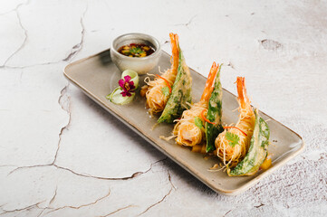 Crispy Golden Shrimp Appetizer on Rectangular Plate