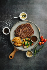 Grilled Steak Dinner with Roasted Potatoes and Vegetables